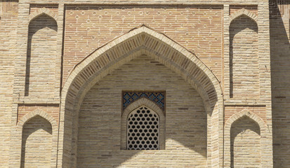 Fototapeta na wymiar Bukhara old town,old beautiful madrasah in Uzbekistan