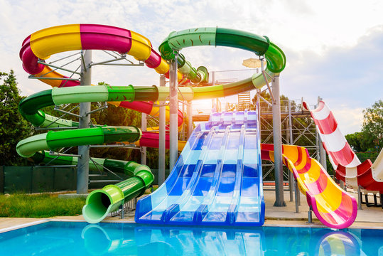 Water park, slides near the pool, summer holidays