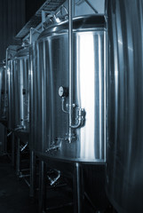 Stainless tanks for fermentation in a beer brewery.