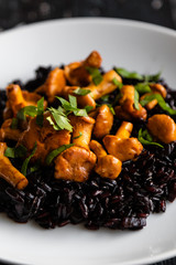 healthy seared girolles mushrooms with black rice