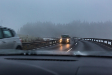 Fototapeta na wymiar Oncoming traffic in winter