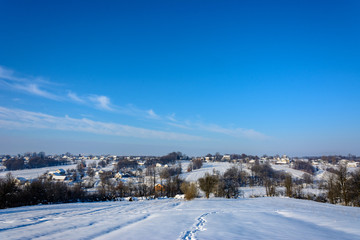 Fototapeta premium A charming Ukrainian village in western Ukraine in winter
