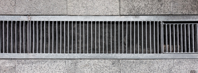 Obraz premium Old metal street water sewer cover top view