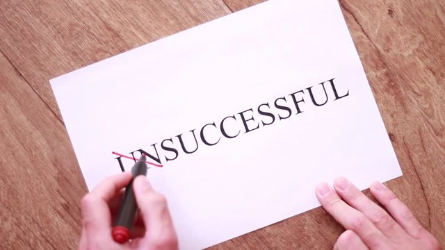 Crossing out "un" in "Unsuccessful" inscription