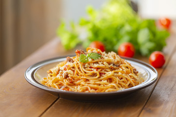 Spaghetti bolognese pasta with tomato sauce and minced meat. Homemade healthy italian pasta on wooden background