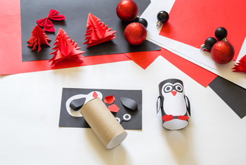 Children's master class hand-made paper penguin.