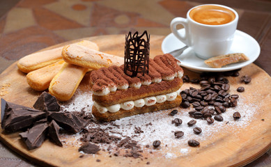 Homemade tiramisu cake is a traditional Italian dessert with coffee
