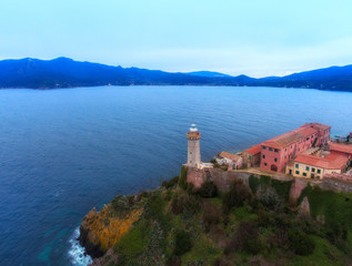 Naklejka premium Aerial view of the old stone lighthouse of Portoferraio, Elba island, Italy.