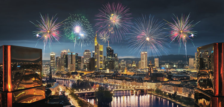 High resolution aerial panoramic view of Frankfurt, Germany with fireworks in the sky.