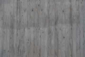 Concrete gray wall with wood plank texture.