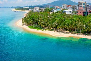beautiful view of the lagoon with white sand and palm trees, turquoise sea. view from the top.