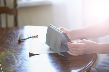 aged woman laptop. old lady in Park. Sunny day, happy mood. upset senior woman with tablet