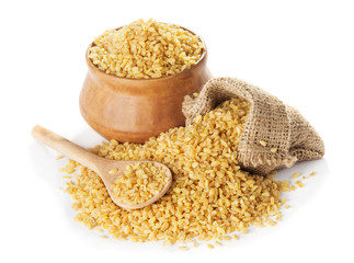 Bulgur  in a bag and clay bowl