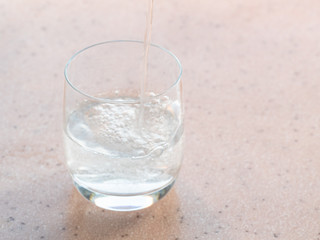 sparkling mineral water fills a glass