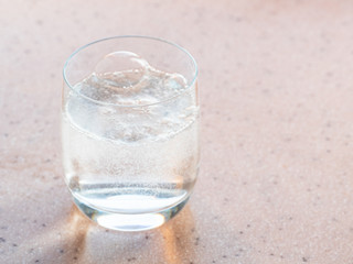 gas bubbles in glass with sparkling mineral water