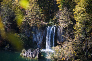 Fototapeta na wymiar Fairytale Waterfall in Autumn at Plitvice Lakes National Park Croatia