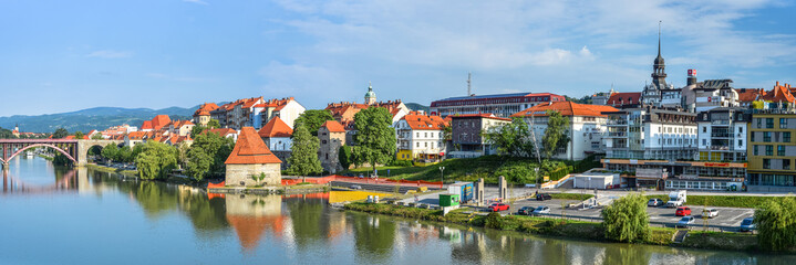 Panorama of Maribor city, Slovenia. Drava River, buildings and mountains of Maribor.