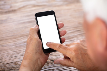 Senior Man Holding Mobile Phone