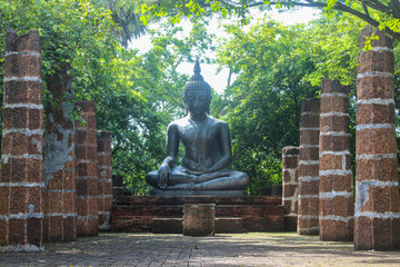 Buddha in the ruins of the temple.