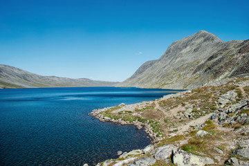 Fototapeta na wymiar landscape with Gjende lake, Besseggen ridge, Jotunheimen National Park, Norway