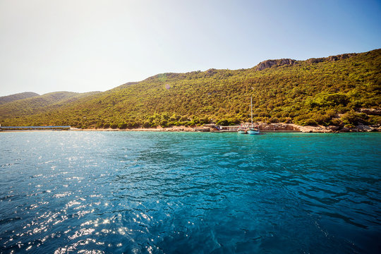 Turquoise water near beach on Aegean coast  sea Turkish resort, Bodrum, Turkey