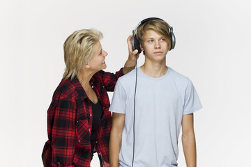 Generation gap. Male teenager not talking after an argument