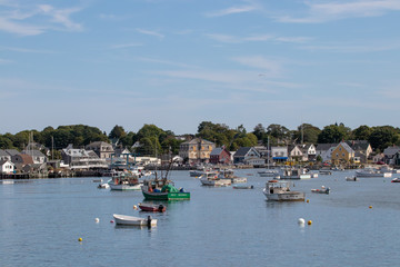 Fototapeta na wymiar Harbor off the coast of Maine and a bright beautiful day