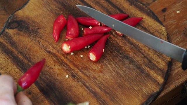 preparation of little red peppers for cooking