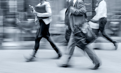 group of business people in the street and blue tonality