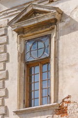 Fototapeta na wymiar The window of the Podgoretskiy castle in Ukraine. Renaissance castle