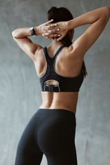 Sports Woman In Fashion Sportswear Stretching Back And Shoulders
