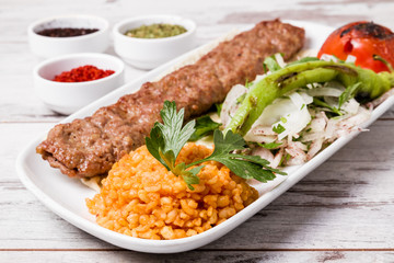 Bulgur Pilaf Served with Meatball in White Plate