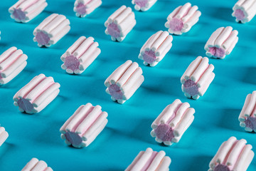 marshmallow pastel shades on a blue background. marshmallow Colorful pattern  