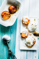 Roasted peaches with vanilla ice cream