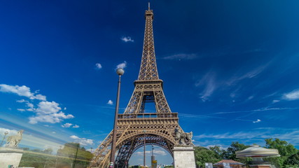 Eiffel Tower from bridge over Siene river in Paris timelapse hyperlapse, France