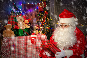 Santa Claus with gifts on Christmas