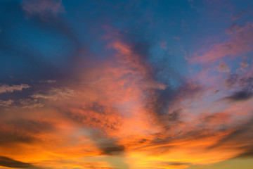 Obraz premium Beautiful twilight sky with orange and blue colour dramatic cloud.