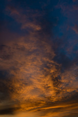 Fototapeta na wymiar Beautiful twilight sky with orange and blue colour dramatic cloud.