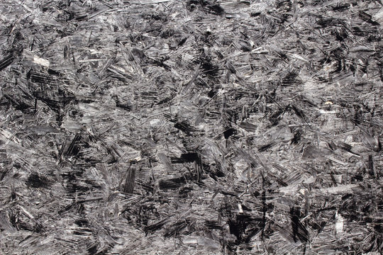Closeup image of black chipboard