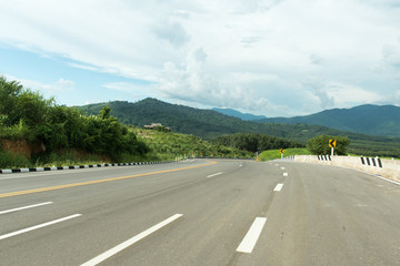 On hill asphalt road and blue sky nature landscape