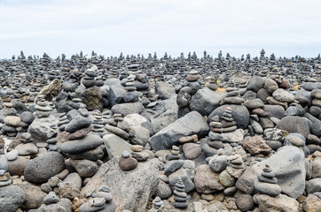 a lot of stacks of stones, zen