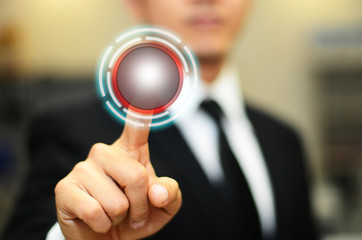 A young businessman working with hologram technology