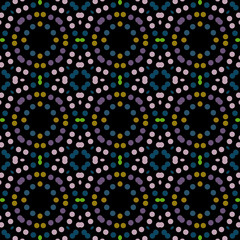 Seamless abstract pattern background with a variety of colored circles.