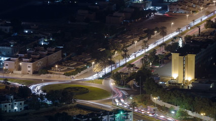 Cityscape of Ajman from rooftop at night timelapse. Ajman is the capital of the emirate of Ajman in the United Arab Emirates.