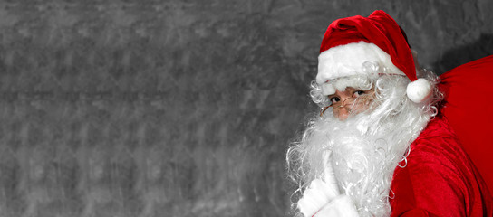 Santa Claus with a bag of gifts on Christmas