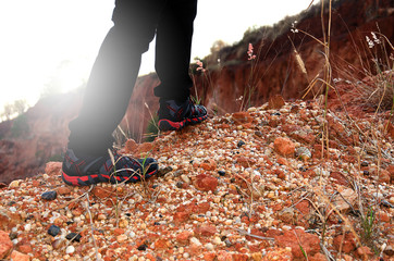 Close-up shoes of tourists are walking on the mountain