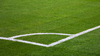 closeup of football (soccer) field with green grass