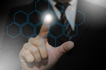 The fingers of the businessmen press of holographic technology