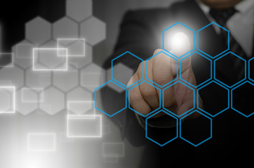 The fingers of the businessmen press of holographic technology