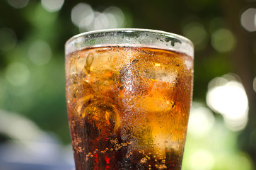 Carbonated water with ice in a glass, drink thirst